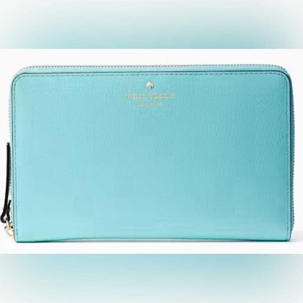 Rare Kate Spade Grand Street Travel Wallet. New with tags. Color: Robins Egg